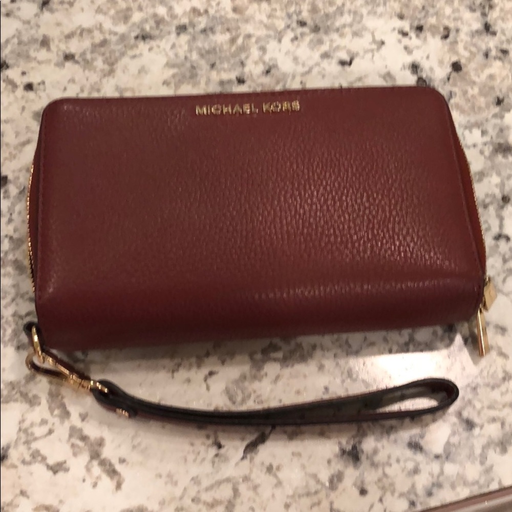 Continental wristlet.  True color is Cinnamon.